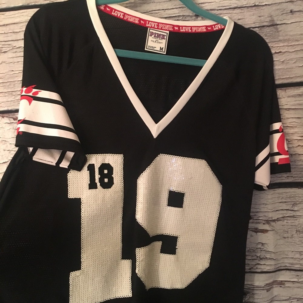 PINK Collegiate UC Football Jersey. Medium.